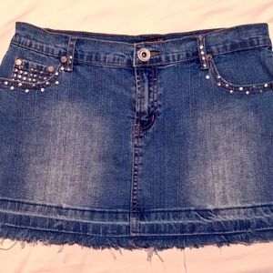 Stretchy denim studded mini skirt